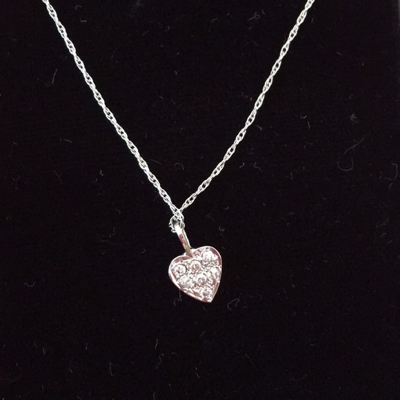 14k white gold and diamond necklace.